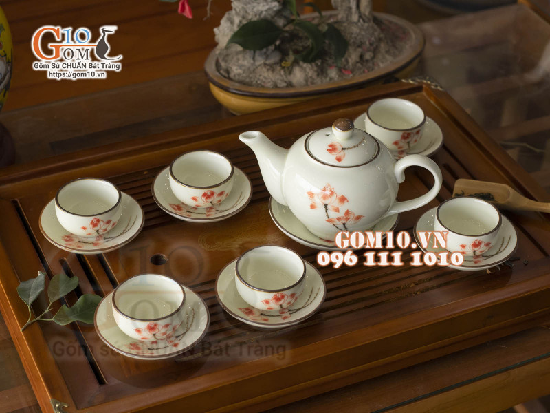 Bộ ấm chén dáng quả hồng men kem vẽ hoa Sen đỏ, 350ml