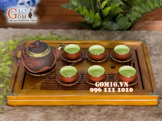 Bộ ấm chén men tử sa đắp tùng đỏ đen, bọc đồng 350ml