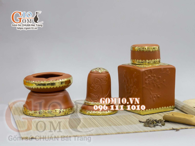 Bộ phụ kiện gốm đỏ bọc đồng