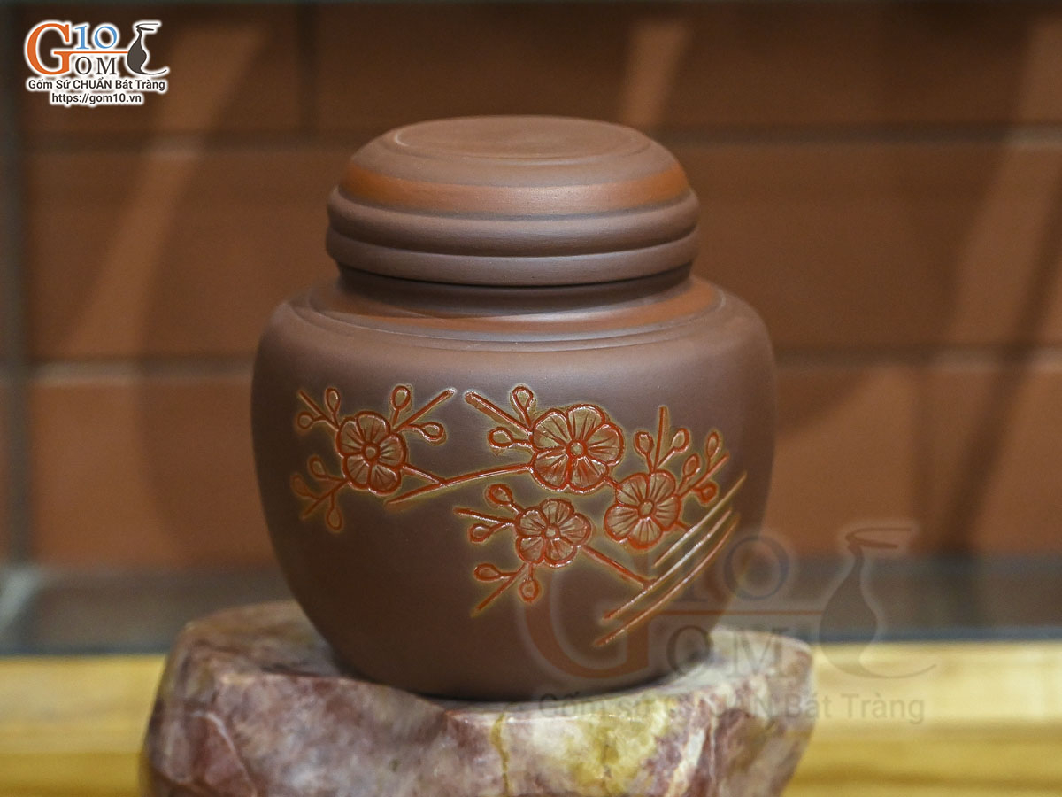 Lọ chè tròn gốm nâu khắc Đào đỏ